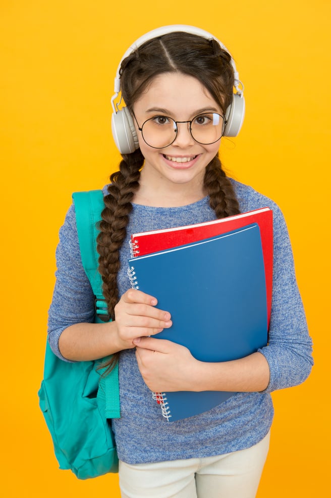 English library online. Happy kid wear headphones. English learning courses. Listening skills. Literature and grammar. English school. Modern life. New technology